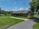 Charming home with well-manicured lawn and pathway at 3412 Ace Ln, Dover, FL 33527