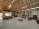 Large garage featuring a seating area and plenty of room for storage or recreational activities at 3412 Ace Ln, Dover, FL 33527
