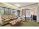 Bright living area featuring comfortable seating and natural light with sliding door access at 36750 Us 19 N # 09208, Palm Harbor, FL 34684