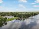 Scenic aerial view of waterfront community featuring lush landscaping, and a gazebo at 4130 Dolphin Dr, Tampa, FL 33617