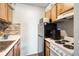 Efficient kitchen with modern appliances, sleek countertops, and ample cabinet space at 4130 Dolphin Dr, Tampa, FL 33617