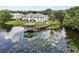 Scenic waterfront community featuring lush landscaping and a covered gazebo at 4130 Dolphin Dr, Tampa, FL 33617