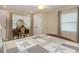 Comfortable bedroom with a vintage vanity, and natural light from a large window at 4206 W Palmira Ave, Tampa, FL 33629