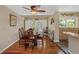 Cozy dining area featuring hardwood floors and views of the outdoor patio at 4206 W Palmira Ave, Tampa, FL 33629