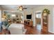 Comfortable living room with hardwood floors open to kitchen view at 4206 W Palmira Ave, Tampa, FL 33629