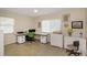Bright home office with lots of workspace and tile flooring for easy cleaning at 4206 W Palmira Ave, Tampa, FL 33629