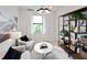 Bright living room with natural light, shiplap walls, stylish decor, and a modern bookshelf at 4547 Gardner St, Bradenton, FL 34210