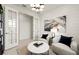 Cozy living room features shiplap walls, modern lighting, and comfortable seating for a relaxing ambiance at 4547 Gardner St, Bradenton, FL 34210