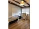 Modest bedroom with minimalist décor, wood-look flooring, and plenty of natural light at 4851 W Gandy Blvd # B2L10, Tampa, FL 33611