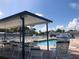 Relaxing community pool area with ample seating and shaded spots at 4851 W Gandy Blvd # B2L10, Tampa, FL 33611