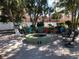 Community fire pit and seating area provides a cozy gathering space at 4851 W Gandy Blvd # B2L10, Tampa, FL 33611