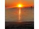 Beautiful sunset view over the water with sunbeams reflecting on the tranquil surface at 4851 W Gandy Blvd # B2L10, Tampa, FL 33611