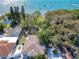 Gorgeous home in Gulfport with lush tropical landscaping and waterfront views near the bay and pier at 5240 31St S Ave, Gulfport, FL 33707