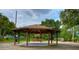 Charming gazebo nestled in a park-like setting with lush greenery and beautiful landscaping at 5240 31St S Ave, Gulfport, FL 33707