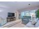 Comfortable living room with stylish furnishings and a large sliding glass door leading to an outdoor area at 5240 31St S Ave, Gulfport, FL 33707