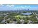 An aerial view of the property, showcasing its proximity to a beautiful lake and the city skyline at 535 22Nd N Ave, St Petersburg, FL 33704
