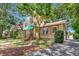 Charming two-story brick home with green awning and mature trees at 535 22Nd N Ave, St Petersburg, FL 33704