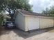 Well-maintained detached garage with a single-car door and space for parking and storage at 535 22Nd N Ave, St Petersburg, FL 33704