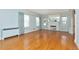 Bright living room featuring hardwood floors, light blue walls, and a fireplace with decorative accents at 535 22Nd N Ave, St Petersburg, FL 33704