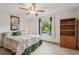 Bedroom with a patterned bedspread and natural light at 5633 99Th N Ter, Pinellas Park, FL 33782