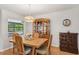 Cozy dining room featuring a wooden table and chairs, perfect for Gathering meals at 5633 99Th N Ter, Pinellas Park, FL 33782