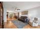 Spacious living area with hardwood floors and comfortable seating arrangement at 5633 99Th N Ter, Pinellas Park, FL 33782