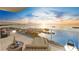 Relaxing balcony view with lounge chair, side table, and stunning waterfront scenery at 5701 Bowen Daniel Dr. # 806, Tampa, FL 33616