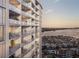 View of multiple condo balconies with outdoor furniture and waterfront views at 5701 Bowen Daniel Dr. # 806, Tampa, FL 33616