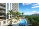 Condo exterior showing pool and balconies with ocean views at 5701 Bowen Daniel Dr. # 806, Tampa, FL 33616