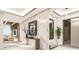 Elegant foyer featuring marble accents and decor with partial ocean view at 5701 Bowen Daniel Dr. # 806, Tampa, FL 33616