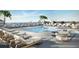 Luxury rooftop pool deck with stylish lounge chairs and clear blue swimming pool at 5701 Bowen Daniel Dr. # 806, Tampa, FL 33616