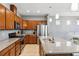 Modern kitchen with stainless steel appliances, granite countertops, and plenty of storage space at 5831 Caldera Ridge Dr, Lithia, FL 33547