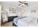 Well-lit main bedroom with carpet, a ceiling fan, and neutral decor, creating a relaxing atmosphere at 5831 Caldera Ridge Dr, Lithia, FL 33547
