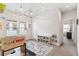 Bright playroom with natural light, colorful pendant lights, and built-in shelves at 5831 Caldera Ridge Dr, Lithia, FL 33547