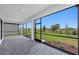 Screened patio area overlooking outdoors at 6133 Wire Grass Ct, Nokomis, FL 34275