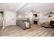 Bright living room featuring a decorative fireplace, neutral colors, and hardwood floors at 615 6Th N Ave, Safety Harbor, FL 34695