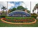 Elegant sign for the Safety Harbor Resort & Spa, surrounded by colorful flowers and manicured landscaping at 615 6Th N Ave, Safety Harbor, FL 34695
