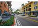 Charming street view in Safety Harbor with palm trees, local businesses, and a 'Welcome to Downtown' sign at 615 6Th N Ave, Safety Harbor, FL 34695