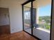 Condo featuring a spacious balcony and sliding glass door at 6218 Palma Del Mar S Blvd # 503, St Petersburg, FL 33715