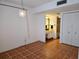 Bedroom featuring tiled floors and ensuite bathroom at 6218 Palma Del Mar S Blvd # 503, St Petersburg, FL 33715