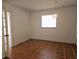 Bedroom featuring a window and patterned tile flooring at 6218 Palma Del Mar S Blvd # 503, St Petersburg, FL 33715