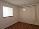 Bright bedroom with a large window and unique light fixture at 6218 Palma Del Mar S Blvd # 503, St Petersburg, FL 33715