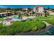 Aerial shot of a stunning pool with lush foliage and waterfront views at 6218 Palma Del Mar S Blvd # 503, St Petersburg, FL 33715