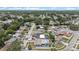 Aerial view of a quiet neighborhood featuring neatly arranged homes and tree-lined streets at 6417 Willow Wood Ln, Tampa, FL 33634