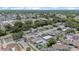 An aerial view showing the property in a neighborhood with mature trees and residential homes at 6417 Willow Wood Ln, Tampa, FL 33634
