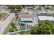 An aerial view of the property, showcasing the house, yard, and neighborhood surroundings at 6417 Willow Wood Ln, Tampa, FL 33634