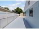 Property backyard featuring a white privacy fence and a storage shed at 6417 Willow Wood Ln, Tampa, FL 33634