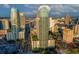 Stunning aerial view of a modern high-rise building in a vibrant cityscape, surrounded by lush greenery and city streets at 777 N Ashley Dr # 2513, Tampa, FL 33602