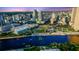 Breathtaking aerial perspective of a city skyline featuring high-rise buildings and a waterfront park along the river at 777 N Ashley Dr # 2513, Tampa, FL 33602