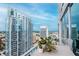 Scenic balcony view with a high-rise and beautiful planters at 777 N Ashley Dr # 2513, Tampa, FL 33602